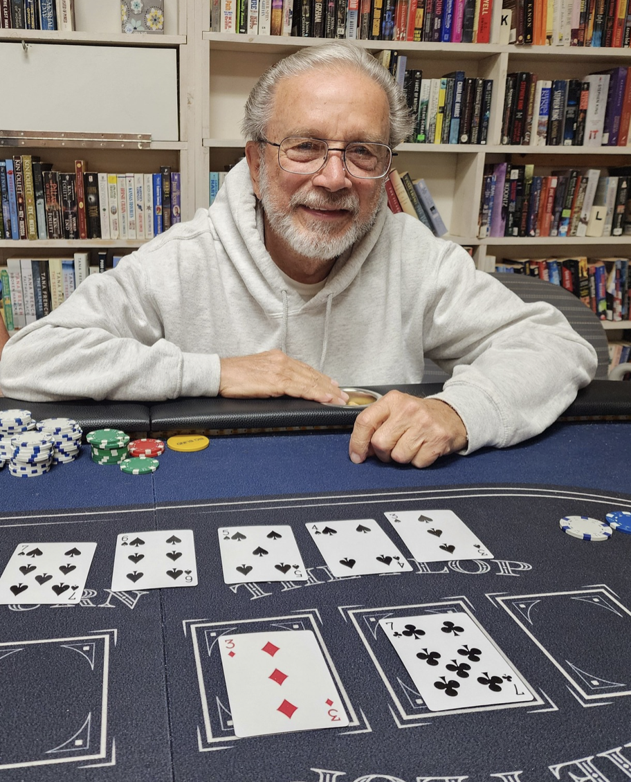Mike winning at poker